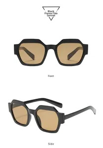 Détails de lunettes de soleil hexagonales noires avec verres teintés thé et monture moderne