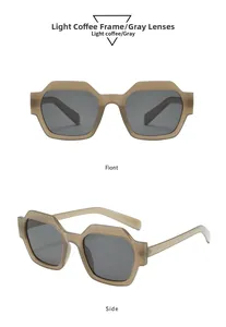 Détail des lunettes de soleil géométriques à monture épaisse café clair avec verres gris