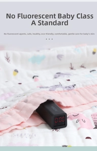 Detail of cotton baby towel showing 0.00 fluorescent test for infant A-class safety