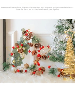 Detail of LED Christmas star wreath with pine cones, red berries and green pine needles