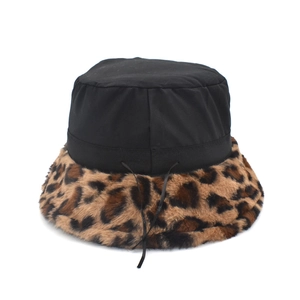 Black bucket hat with leopard print faux fur brim and adjustable drawstring for women