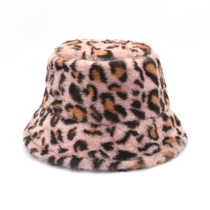 Close-up of pink leopard print fuzzy bucket hat with thick plush texture for winter
