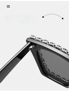 Macro detail of high-shine black frame with durable metal hinge and sparkling rhinestones