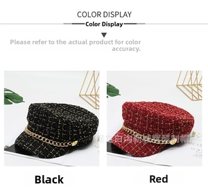 Detail of tweed newsboy hats in black and red with gold chain and woven texture