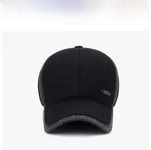 Detail view of winter baseball cap with side metal sport logo and fleece paneling