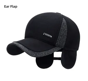 Detail of winter baseball cap with foldable ear flaps and metal sport tag accent