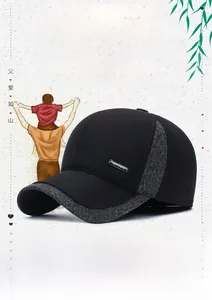 Detailed view of winter baseball cap with knit ear flaps and SPORT metal logo