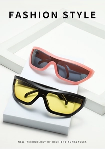 Detail showing two pairs of oversized one-piece cycling sunglasses in pink and black frames