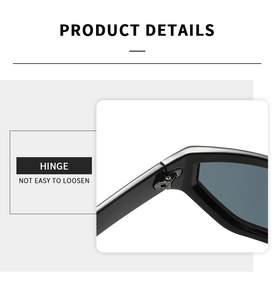 Close-up of durable metal hinge on black oversized sunglasses with a sturdy screw structure