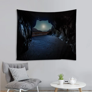 Detailed view of nature tapestry showing moonlight cave and beach landscape on bedroom wall