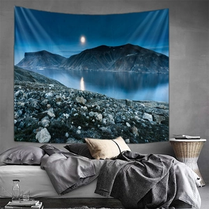 Modern wall tapestry featuring deep blue night lake and snowy mountain landscape detail