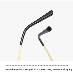 Close-up of golden curved metal temples with ergonomic black tips for star sunglasses