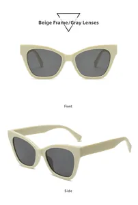 Detail view of beige cat-eye sunglasses with gray lenses showing front and side profiles