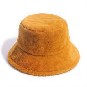 Detail view of plush orange faux rabbit fur bucket hat showing soft thick fiber texture