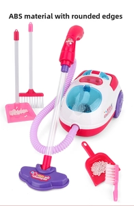 Close-up of kids cleaning set with vacuum and broom featuring rounded edges for safety