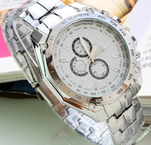 Close-up of silver-tone men's sports watch with white chronograph dial and tachymeter bezel