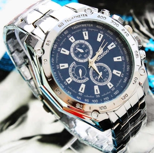 Detail view of Orlando men's silver steel watch with a deep blue tachymeter dial