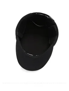 Close-up of the black winter cap interior with fashion ribbon and thermal lining