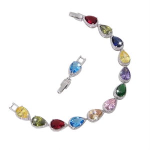 Macro shot of colorful pear-cut cubic zirconia bracelet with silver extension clasp