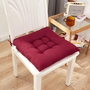 Thick burgundy square chair cushion with anti-slip ties and nine-point stitching