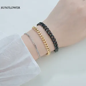 Men's hip hop stainless steel Cuban link bracelets in silver, gold, and black finishes