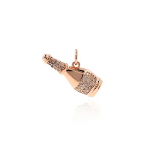 18k gold plated champagne bottle pendant with rose gold finish and pavé cubic zirconia