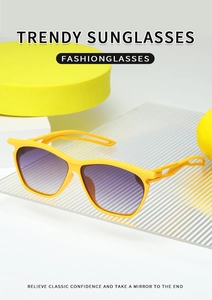 Detail of yellow hollow temples and purple gradient lenses on trendy sunglasses