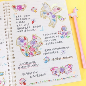 3D colorful crystal heart and butterfly stickers on a notebook for DIY decoration