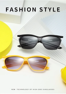 Fashion sunglasses with thick frames and hollowed legs displayed on geometric props