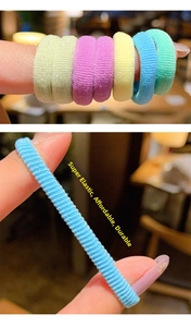 Elastic macaron hair ties showing strong stretch detail and soft pastel nylon material