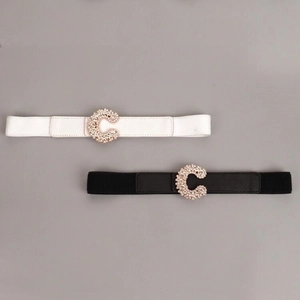 Women's elastic waist belt with rhinestone C-buckle available in black and white colors
