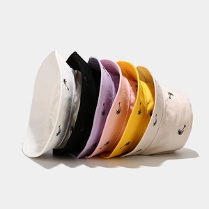 Outdoor cotton bucket hats for men and women featuring coconut tree embroidery in multiple colors
