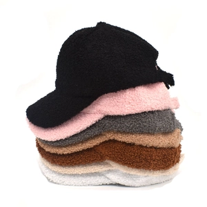 Plush lamb wool baseball caps for winter in multiple colors shown on white background