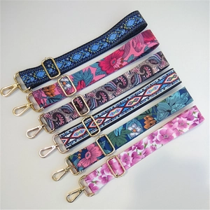 Adjustable wide floral purse straps with gold buckles in various bohemian ethnic patterns