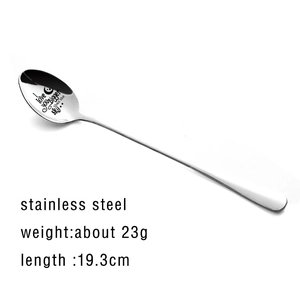 Macro detail of stainless steel spoon engraved with I love you BIGGER than the sky text
