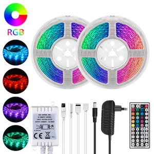 LED light strip kit with RGB color rolls, remote control, and power adapter in detail