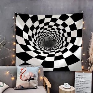 Detail of wall tapestry featuring black and white checkerboard spiral optical illusion