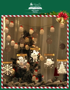Warm white LED Christmas window lights with snowflake snowman and Santa Claus designs