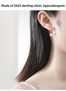 Close-up of S925 sterling silver hoop earrings with white pearl and sparkling crystals