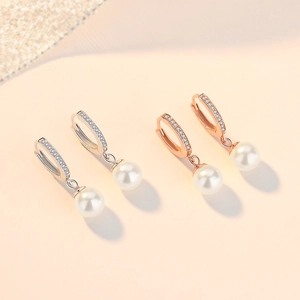 Elegant S925 sterling silver hoop earrings with white pearl pendants and pavé zircon stones