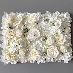 Macro shot of white artificial silk hydrangeas and roses for wedding flower wall decor
