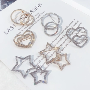 Sparkling crystal rhinestone brooches in heart, star, and circle shapes, gold and silver