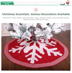 Detail of red and white knitted Christmas tree skirt with large snowflake pattern and trim