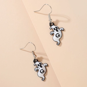 Detail shot of white ghost earrings with black expressions for Halloween costume