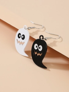 Detail of whimsical black and white ghost earrings with dangling hooks for Halloween