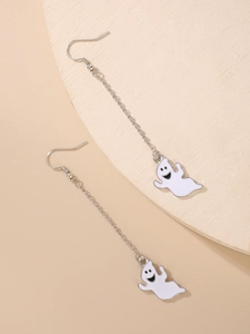 Detailed view of dangling white ghost earrings with enamel finish for Halloween