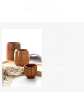 Detailed view of handcrafted natural wood cups showing unique grain and organic textures