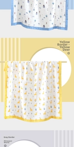 Detailed close-up of soft cotton gauze baby towels in elk, dinosaur and forest patterns
