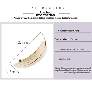 Polished gold leaf hair clip detail showing dimensions 12.3cm by 2.5cm with brushed alloy