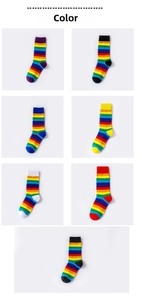 Close-up of rainbow striped crew socks in seven diverse vibrant color combinations